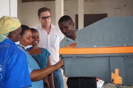 Felix Brooks-church during a training session at one of Sanku’s partner mills in Tanzania. Photo: WFP/Leah Kidd