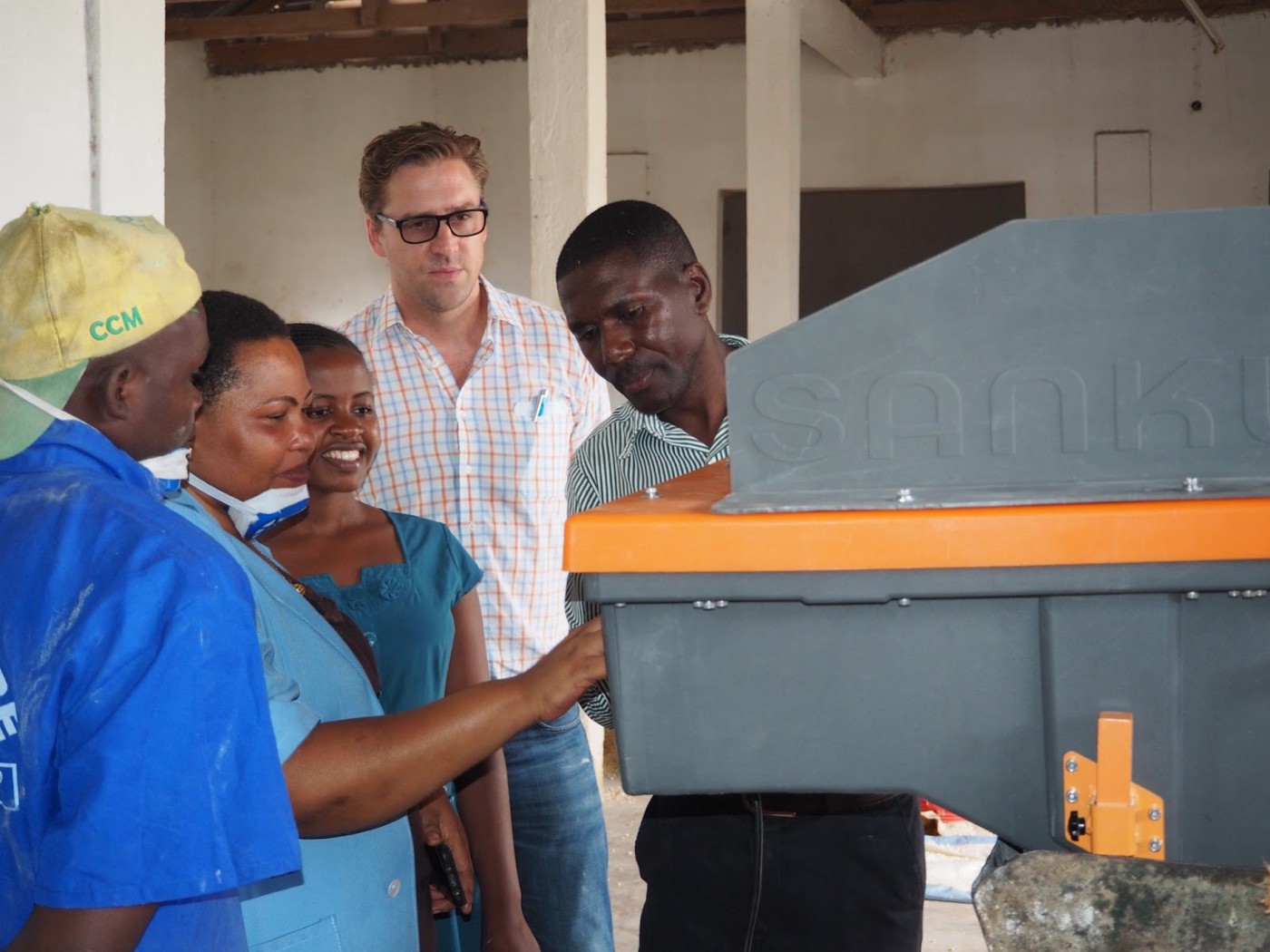 Felix Brooks-church during a training session at one of Sanku’s partner mills in Tanzania. Photo: WFP/Leah Kidd