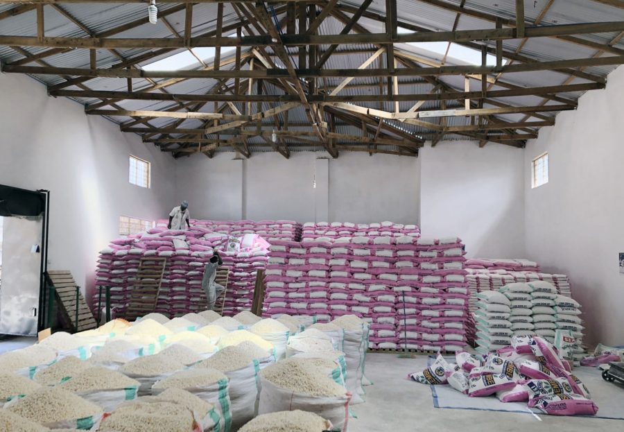 a warehouse room full of Sanku flour bags